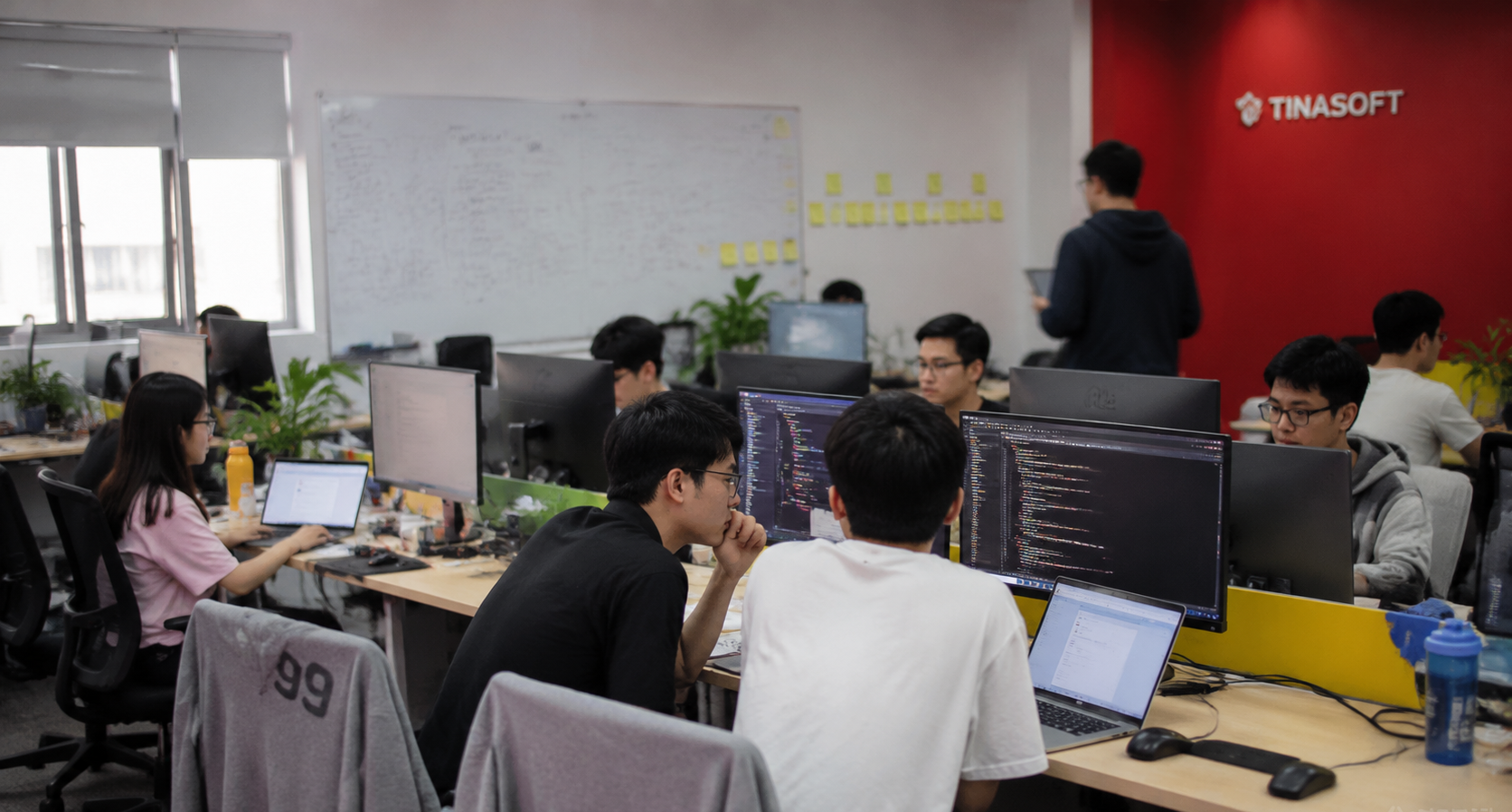 Software outsourcing Singapore — Tinasoft Vietnam engineering team working at Hanoi office